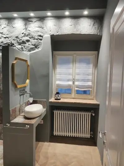 Medium apartment bathroom with window